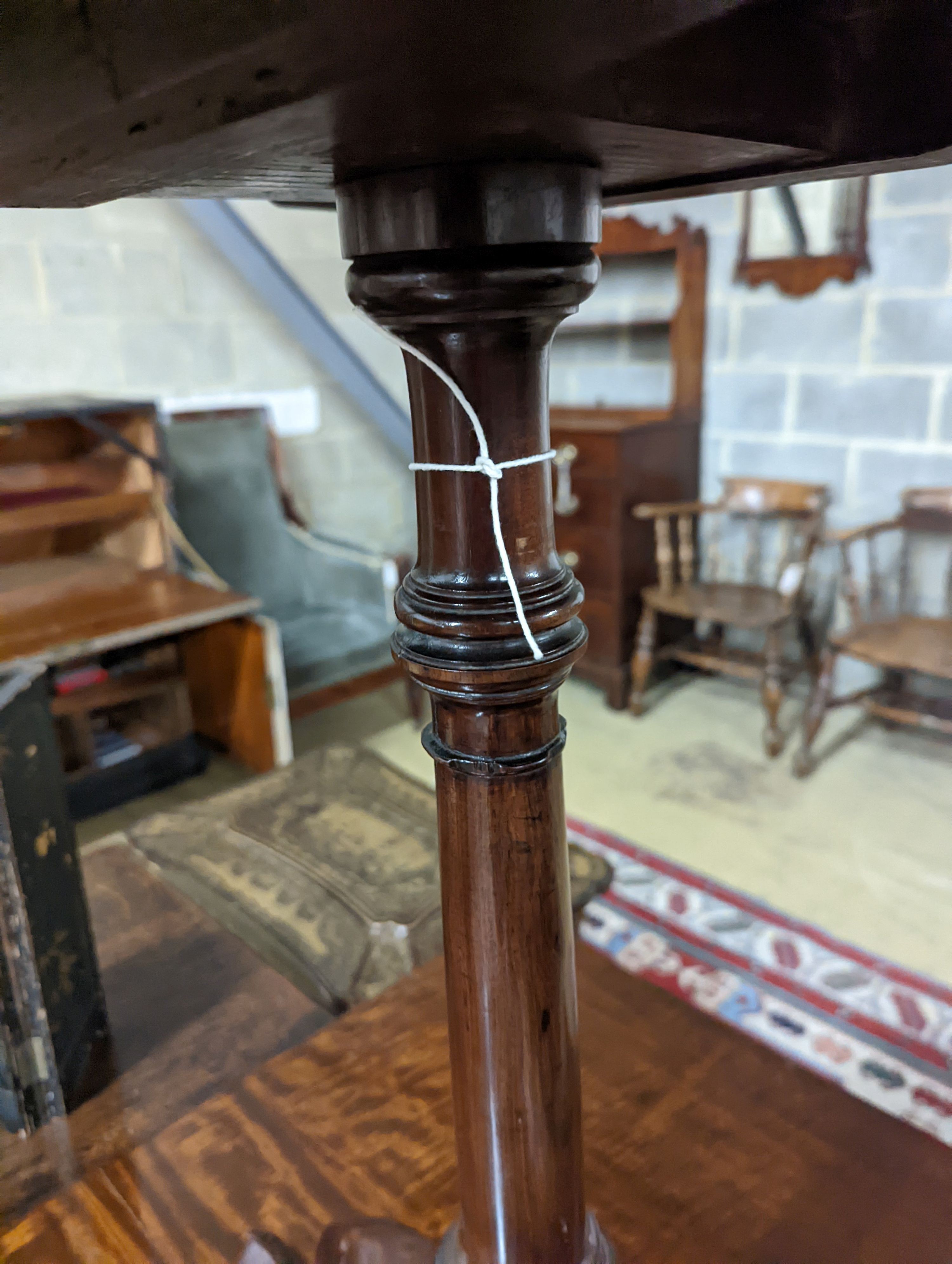 A George III and later mahogany Tripod Wine Table. Diameter - 49cm, Height - 67cm.